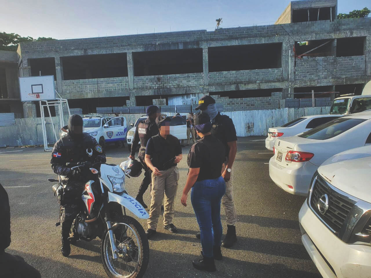Police and Destiny Rescue agents preparing to raid